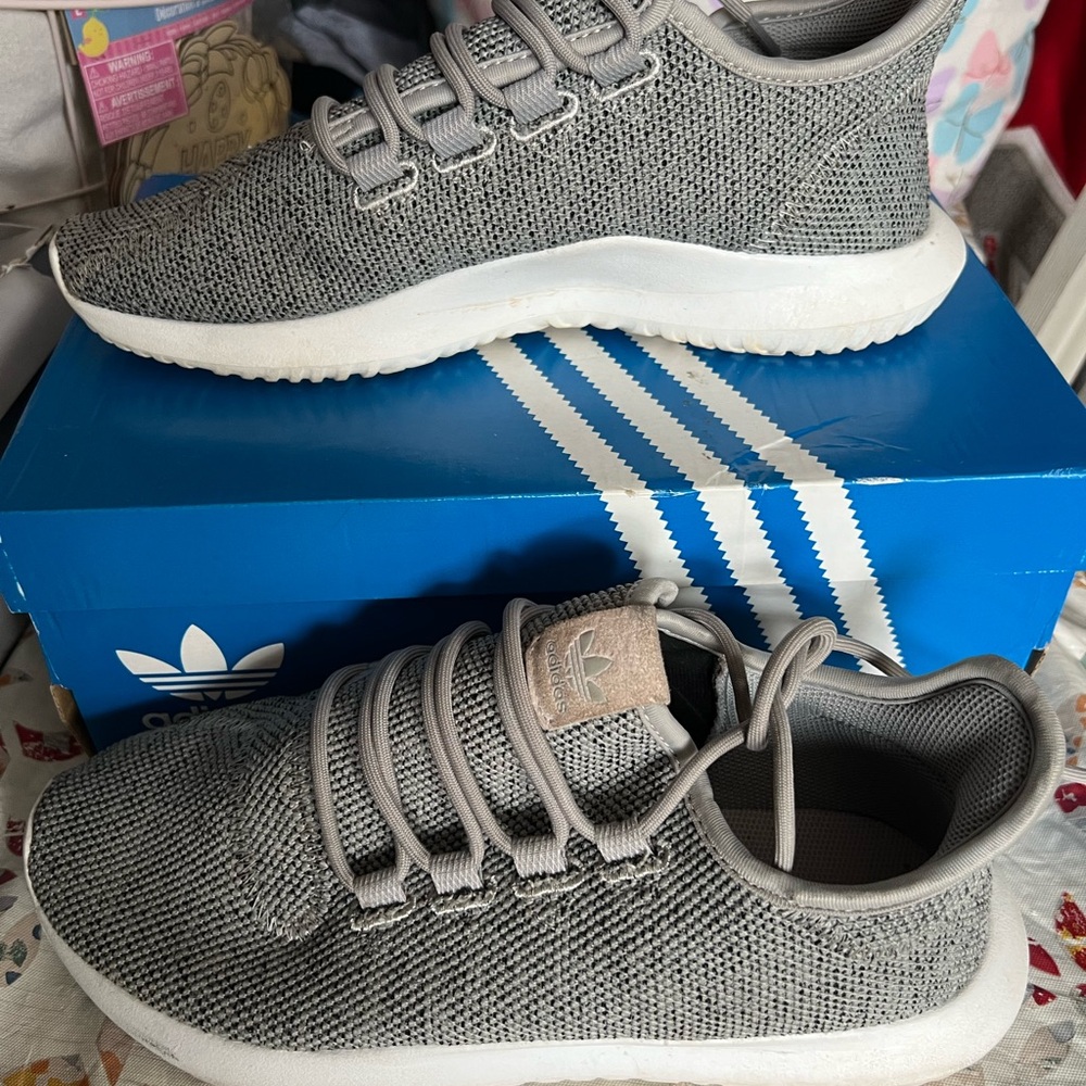 Used but excellent condition tennis shoes by adidas